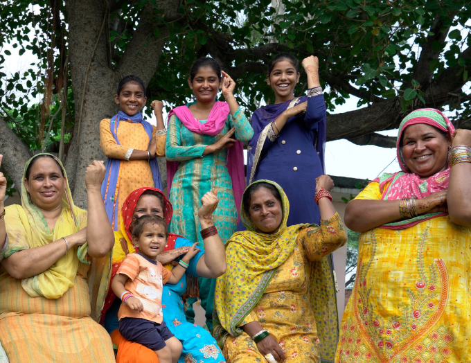 Women of our Self Help Group in Aloona Tola village playfully posing for the camera.