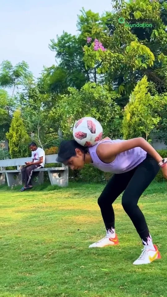 Over 3,000 rural girls are training with us in football under our 1 Girl 1 Football program. These girls are breaking gender stereotypes in their villages by being seen on the sports ground, playing football. They are gaining confidence, skills, and friends to last a lifetime.
Much like Param, the latest rap singer from Punjab, who is rising against the odd in a world where our rural women are very rare.

ਜਦੋਂ ਤੁਹਾਡੇ ਦਿਲ ਵਿੱਚ ਕੁਝ ਕਰਨ ਦੀ ਇੱਛਾ ਹੁੰਦੀ ਹੈ, ਤਾਂ ਇਹ ਮਾਇਨੇ ਨਹੀਂ ਰੱਖਦਾ ਕਿ ਤੁਸੀਂ ਕਿੱਥੋਂ ਆਏ ਹੋ। ਪਰਮ, ਤੁਹਾਡੀ ਮਿਹਨਤ ਅਤੇ ਜਜ਼ਬੇ ਨੇ ਇਸ ਗੀਤ ਨੂੰ ਸਿਖਰ 'ਤੇ ਪਹੁੰਚਾਇਆ ਹੈ। ਅਸੀਂ ਭਵਿੱਖ ਵਿੱਚ ਵੀ ਤੁਹਾਡੀ ਸਫਲਤਾ ਦੀ ਕਾਮਨਾ ਕਰਦੇ ਹਾਂ। 
ਅਤੇ ਅਸੀਂ ਆਪਣੀਆਂ ਫੁੱਟਬਾਲ ਖਿਡਾਰਨਾਂ ਲਈ ਵੀ ਇਹੀ ਦੁਆ ਕਰਦੇ ਹਾਂ।

@paramsworld 

#param #thatgirl #Football #Roundglassfoundation #Punjab