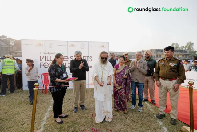 The biggest sports event of rural Punjab is now live: Roundglass Foundation Village Sports Festival 2025, presented by Kavita & Vinod Khanna Foundation. Gratitude to Sri Sri Ravi Shankar ji for gracing the occasion with his divine presence. His blessings are with every child and coach. Thank you, Kavita ji, for your unwavering support. To all our partners and sponsors, this wouldn’t have been possible without your backing. 
Now, it’s time to kick some goals. 
 
ਪੰਜਾਬ ਦੇ ਪਿੰਡਾਂ ਦਾ ਸਭ ਤੋਂ ਵੱਡਾ ਖੇਡ ਸਮਾਗਮ ਸ਼ੁਰੂ ਹੋ ਚੁੱਕਾ ਹੈ। ਰਾਊਂਡਗਲਾਸ ਫਾਊਂਡੇਸ਼ਨ ਵੱਲੋਂ ਕਵੀਤਾ ਤੇ ਵਿਨੋਦ ਖੰਨਾ ਫਾਊਂਡੇਸ਼ਨ ਦੇ ਸਹਿਯੋਗ ਨਾਲ ਕਰਵਾਏ ਜਾ ਰਹੇ ਵਿਲੇਜ ਸਪੋਰਟਸ ਫੈਸਟਿਵਲ 2025 ਵਿਖੇ ਸ੍ਰੀ ਸ੍ਰੀ ਰਵੀ ਸ਼ੰਕਰ ਜੀ ਦੀ ਪਵਿੱਤਰ ਹਾਜ਼ਰੀ ਲਈ ਅਸੀਂ ਉਨ੍ਹਾਂ ਦੇ ਦਿਲੋਂ ਧੰਨਵਾਦੀ ਹਾਂ। 
ਉਹਨਾਂ ਦੀਆਂ ਦੁਆਵਾਂ ਸਾਡੇ ਹਰ ਬੱਚੇ ਅਤੇ ਕੋਚ ਨਾਲ ਹਨ।
ਕਵੀਤਾ ਜੀ ਦੇ ਨਿਰੰਤਰ ਸਹਿਯੋਗ ਲਈ ਵੀ ਵਿਸ਼ੇਸ਼ ਧੰਨਵਾਦ।
ਸਾਰੇ ਸਾਥੀਆਂ ਅਤੇ ਸਪਾਂਸਰਾਂ ਦਾ ਵੀ ਤਹਿ-ਦਿਲੋਂ ਧੰਨਵਾਦ, ਜਿਨ੍ਹਾਂ ਤੋਂ ਬਿਨਾਂ ਇਹ ਸੰਭਵ ਨਹੀਂ ਸੀ।

#villagesportsfestival2025 #roundglassfoundation #punjab
