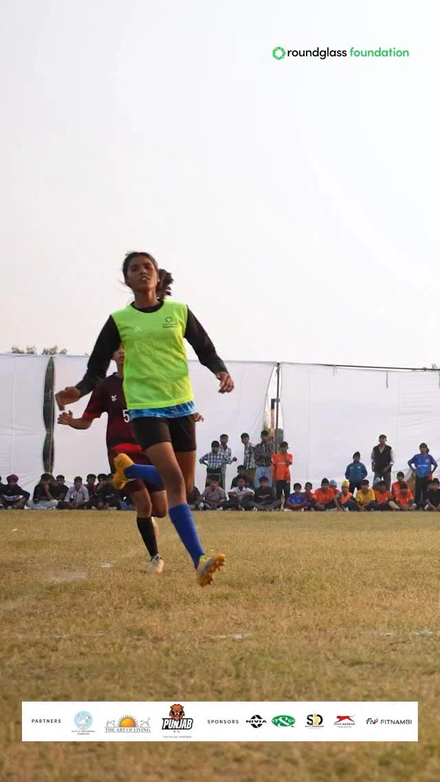 Some more glimpses from the grand opening ceremony of Roundglass Foundation Village Sports Festival 2025. Our Lead, Vishal Chowla, shares the vision behind our efforts to reignite the culture of sports in Punjab. Girls are adding to the revolution by stepping out to play football and chipping away centuries old gender stereotypes. More power to our girls.
 
Keep coming back here to catch all the action from the Sports Festival.

ਰਾਊਂਡਗਲਾਸ ਫਾਊਂਡੇਸ਼ਨ ਦੇ ਵਿਲੇਜ ਸਪੋਰਟਸ ਫੈਸਟੀਵਲ 2025 ਦੀ ਸ਼ਾਨਦਾਰ ਸ਼ੁਰੂਆਤ ਦੀਆਂ ਕੁਝ ਹੋਰ ਝਲਕਾਂ ਪੇਸ਼ ਹਨ। ਸਾਡੇ ਲੀਡ ਵਿਸ਼ਾਲ ਚੋਵਲਾ ਜੀ ਨੇ ਦੱਸਿਆ ਕਿ ਪੰਜਾਬ ਦਿਆਂ ਪਿੰਡਾਂ ’ਚ ਖੇਡਾਂ ਦੀ ਰੂਹ ਨੂੰ ਮੁੜ ਜਗਾਉਣ ਲਈ ਇਹ ਯਤਨ ਕਿਵੇਂ ਇੱਕ ਨਵੀਂ ਲਹਿਰ ਬਣ ਰਹੇ ਹਨ।

ਅੱਜ ਸਾਡੇ ਪਿੰਡਾਂ ਦੀਆਂ ਕੁੜੀਆਂ ਵੀ ਮੈਦਾਨ ਵਿੱਚ ਉਤਰ ਕੇ ਫੁੱਟਬਾਲ ਖੇਡ ਰਹੀਆਂ ਹਨ ਅਤੇ ਪੁਰਾਣੀਆਂ ਸੋਚਾਂ ਨੂੰ ਤੋੜ ਕੇ ਆਪਣੇ ਲਈ ਨਵੇਂ ਰਾਹ ਬਣਾ ਰਹੀਆਂ ਹਨ। ਸਾਡੀਆਂ ਧੀਆਂ ਦੀ ਇਸ ਹਿੰਮਤ ਨੂੰ ਸਲਾਮ ਹੈ। 

#roundglassfoundation #village #sports #festival #football